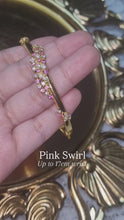 Load and play video in Gallery viewer, Pink Swirl Bangle
